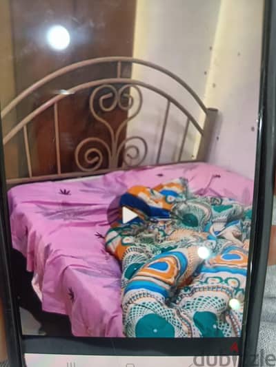 large bed with mattress in good condition