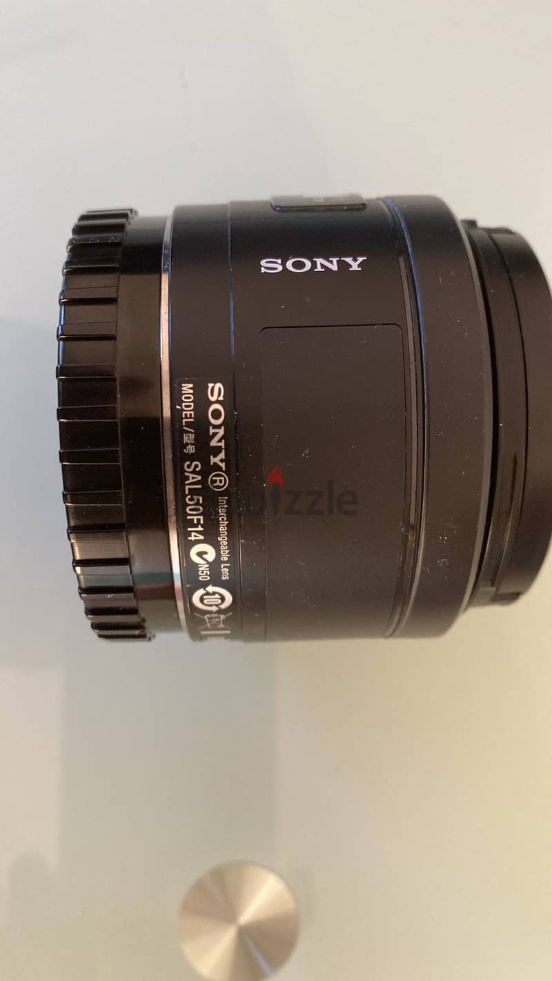 SONY A MOUNT 50 MM 1.4  AND    SONY A MOUNT 18 TO 55 MM 3
