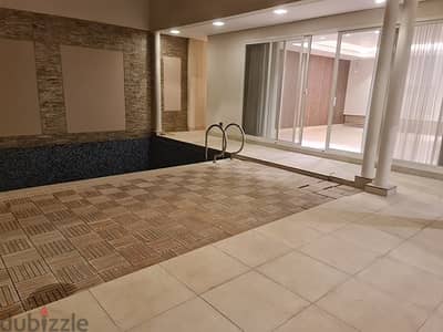A modern villa with a swimming pool and garden for rent in the Hittin