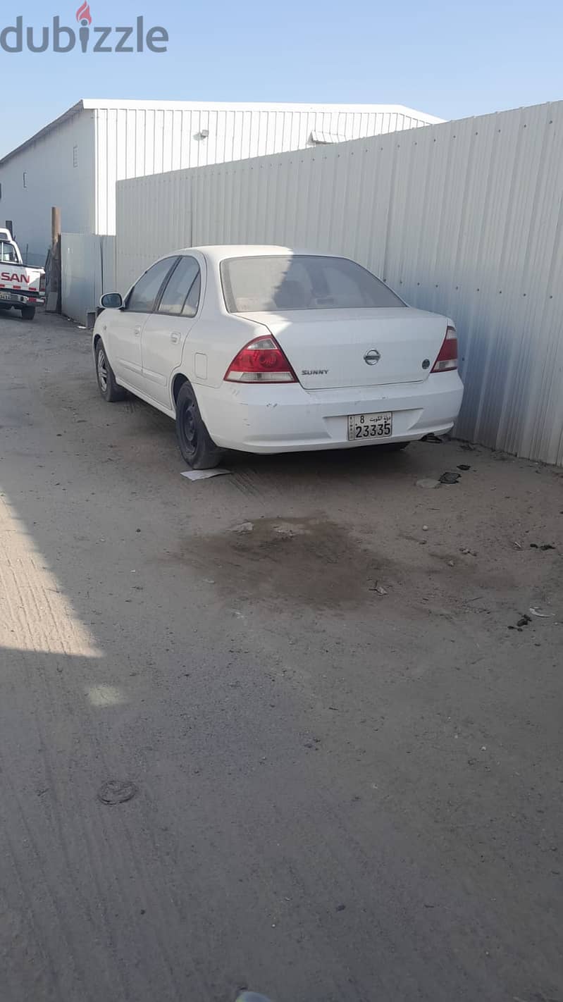 Nissan Sunny 2009 – White – For Sale in Kuwait 1