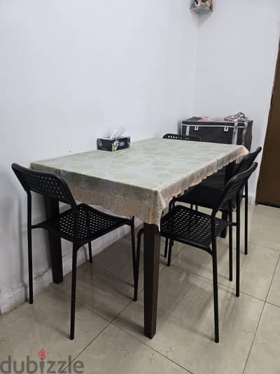 4-seater dining table set with modern chairs - Great condition!