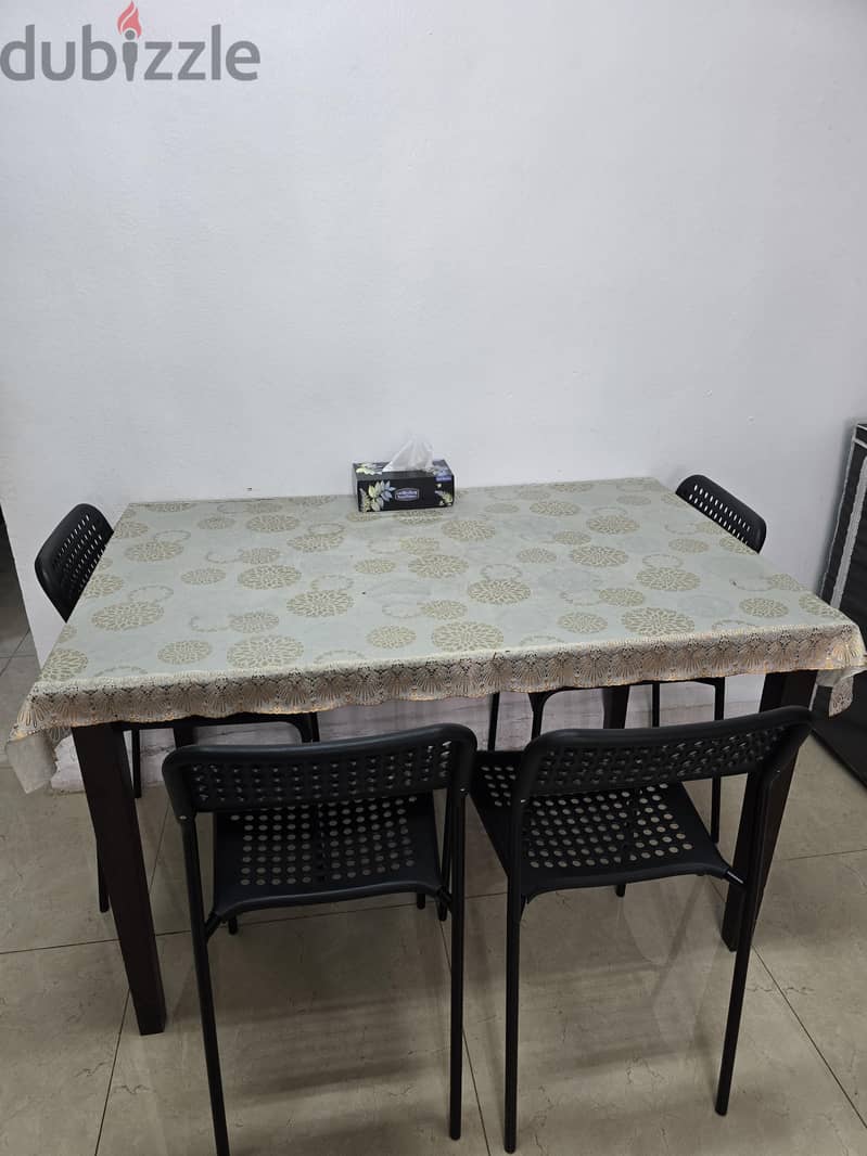 4-seater dining table set with modern chairs - Great condition! 1