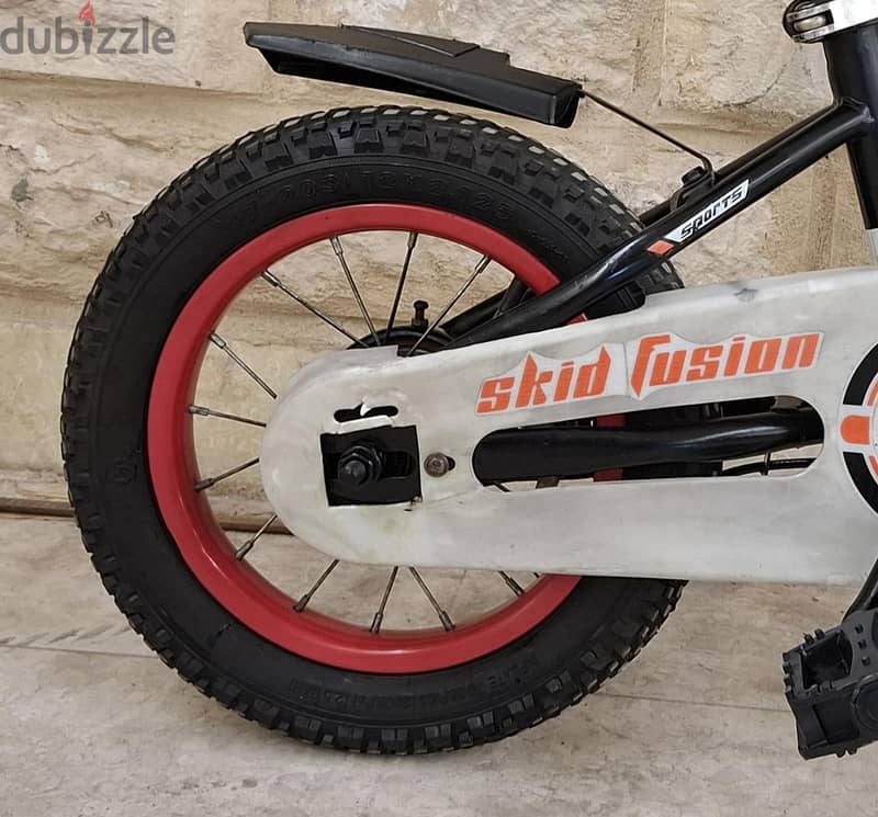 Selling bike SKID FUSION size 12inch with support wheels 3