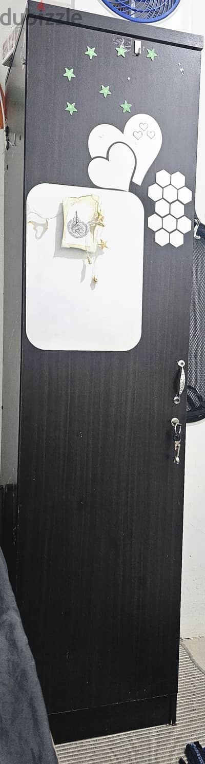 Wooden cupboard in good condition.