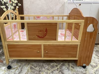 Baby crib, wooden design, one side open,comfortable, up till 3 years.