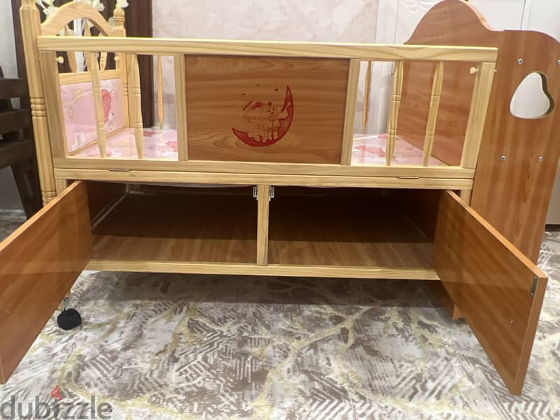 Baby crib, wooden design, one side open,comfortable, up till 3 years. 1