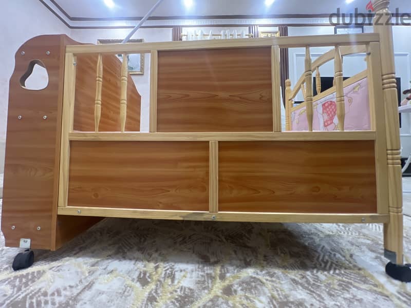 Baby crib, wooden design, one side open,comfortable, up till 3 years. 4