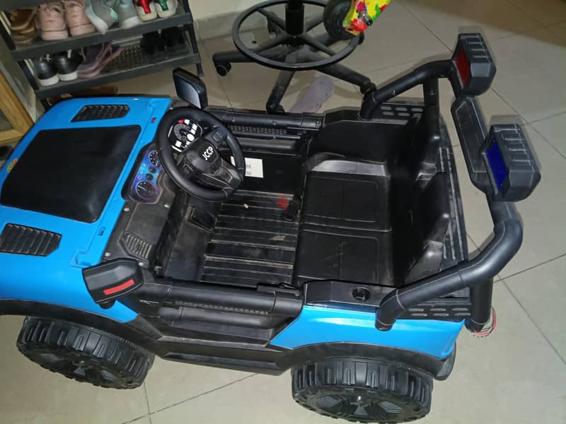 battery car for sale with battery charger. 1