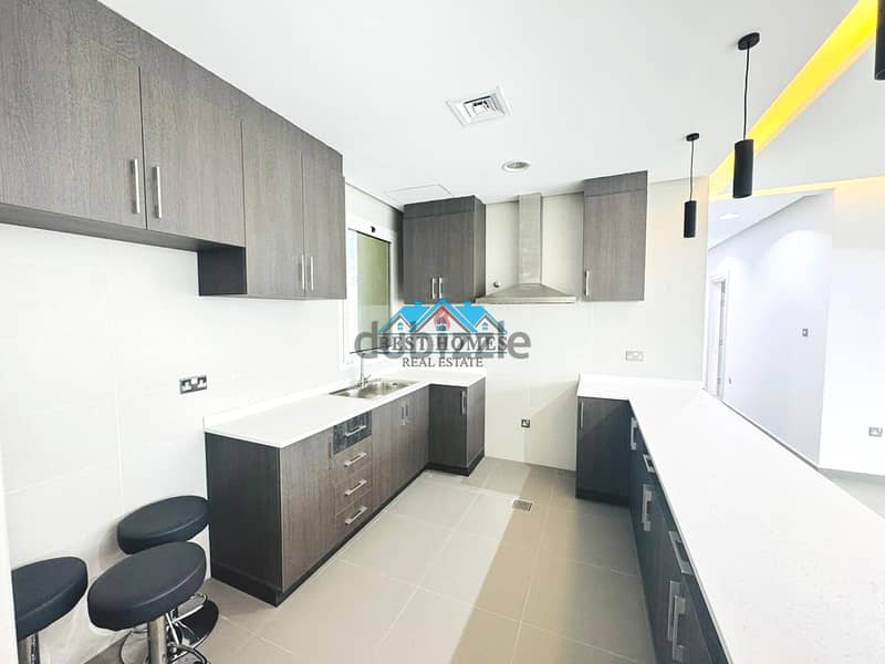 Modern 3 Bedroom Apartment with Open-Plan Kitchen in Hessa Al Mubarak 9