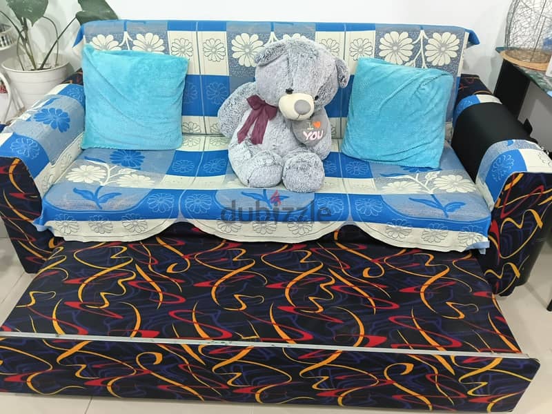 sofa come bed with glass teapoy 2