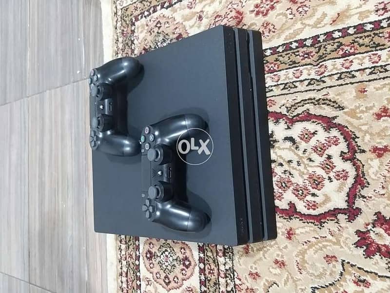 Play station 4 pro 1 tb 0