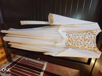 Preloved White gown with golden sequence work