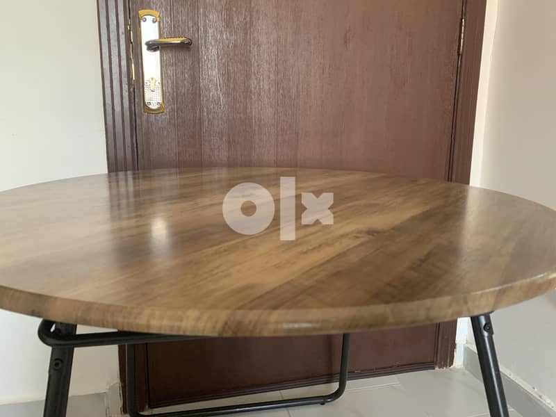 Wooden round table with four chairs . . 2